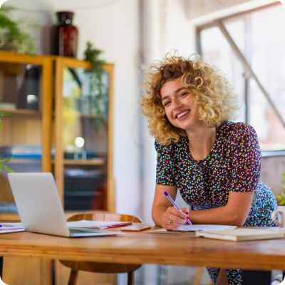 Woman working and happy to undertake. Entrepreneurship opens doors that would otherwise be difficult to open.